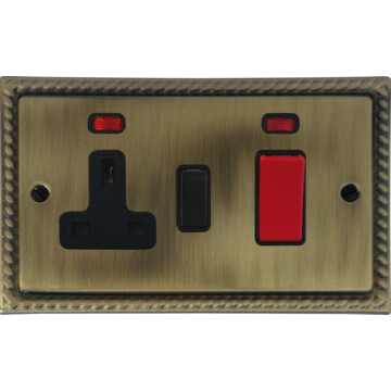 georgian light antique brass cooker switch with socket (black switch) front fc0825